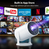 Compact 4K mini projector with built-in app store showing YouTube, Prime Video, Netflix, and Hulu streaming apps