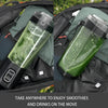 Portable electric fruit mixer containing green smoothie inside hiking backpack; two side-by-side views showing mixer in backpack pocket; "Take anywhere to enjoy smoothies and drinks on the move" text