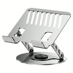 Silver metal laptop stand with ventilated tray, folding scissor-leg arms, and 360-degree swivel circular base, product shot on white background