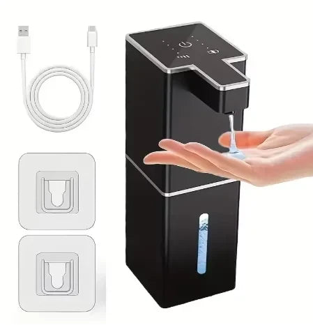 USB rechargeable automatic foam soap dispenser in black with USB charging cable and two adhesive wall mount brackets, dispensing liquid soap into hand