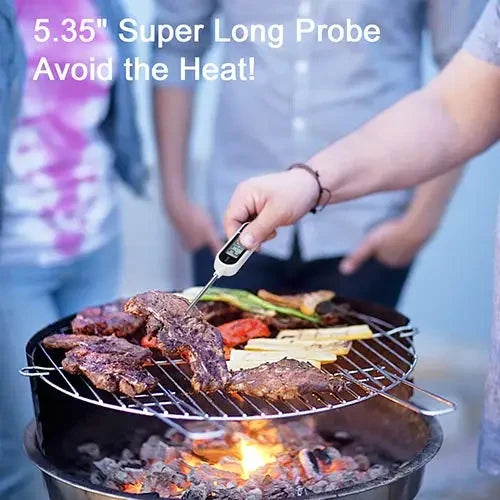 Person using 5.35-inch super long probe digital thermometer to check meat temperature on outdoor charcoal grill; "5.35 Super Long Probe — Avoid the Heat" text