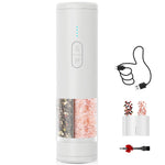 White 2-in-1 electric salt and pepper grinder with dual S and P buttons, teal LED dots, split transparent chamber; includes USB charging cable, refill funnel, and cleaning brush, on white background