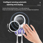 Hand waving in front of automatic toothbrush dryer showing infrared sensor opening and closing