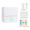 White portable thermal pocket printer with 3 thermal paper rolls, 3 colored self-adhesive sticker rolls, and USB cable package contents