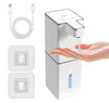USB rechargeable automatic foam soap dispenser in white with USB charging cable and two adhesive wall mount brackets, dispensing liquid soap into hand