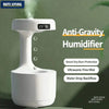 Anti-gravity humidifier emitting fine mist with features listed: dry burn protection, ultrasonic fine mist, water drop backflow
