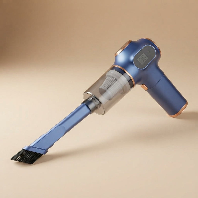 Blue and gold portable handheld vacuum cleaner with brush attachment and clear dust canister, angled on beige background