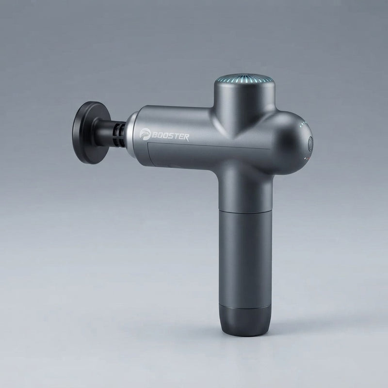 Booster Lightsaber electric muscle massage gun in dark grey with teal LED top, flat disc attachment, and power button on grey background