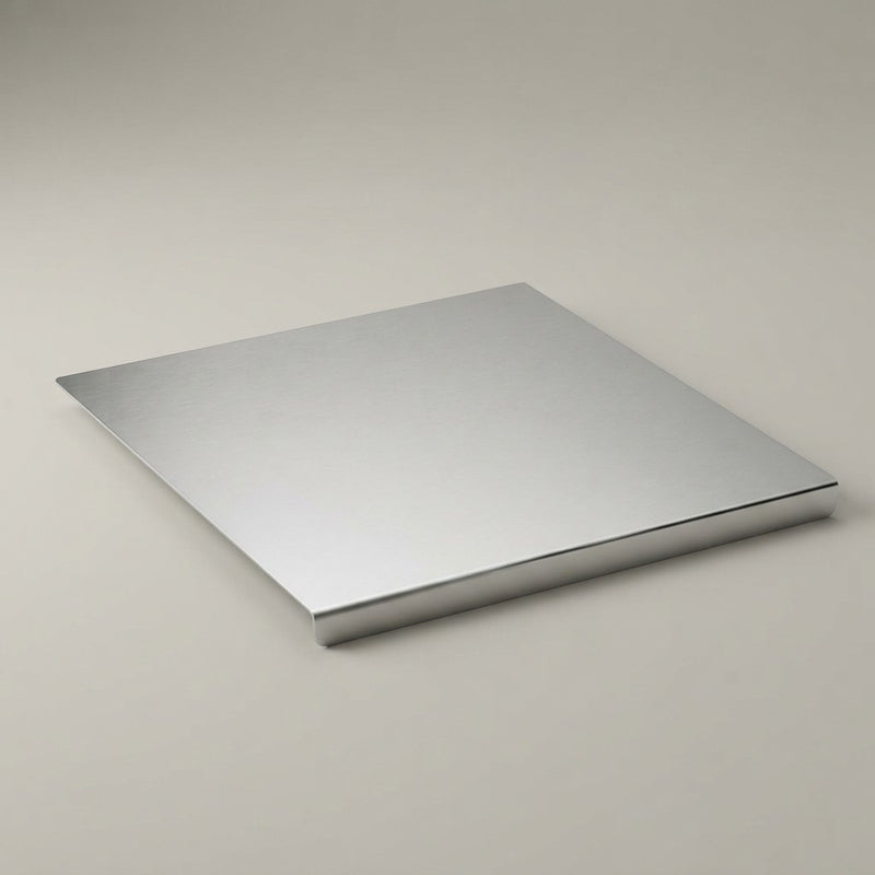 Stainless steel kitchen cutting board flat lay on neutral background